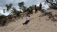 28-Ebony & John watch Joanna slide down a Border track dune